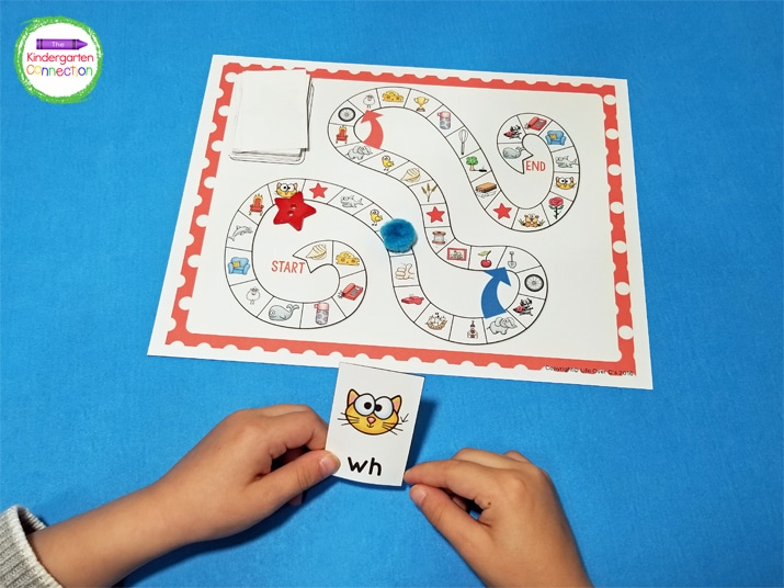 Players will draw a card, read the word, then move their game piece to the next space that has a picture with the same digraph as their card.