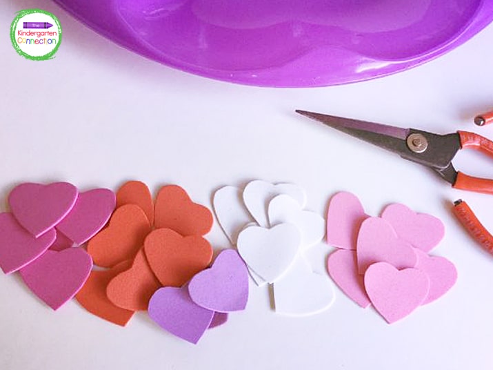 Cut small hearts out of various colors of craft foam.