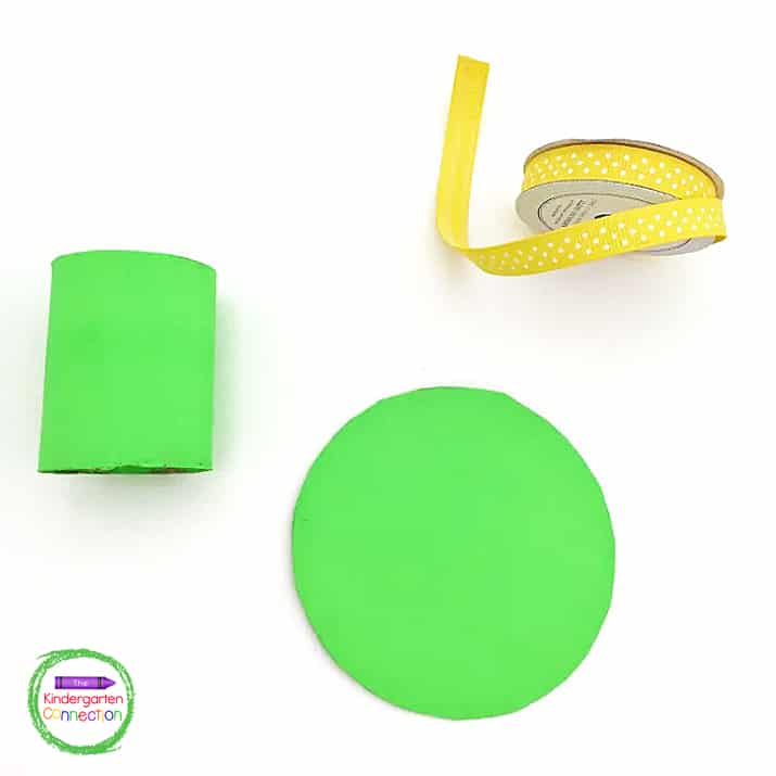 Once the cardboard is cut, invite the kids to paint the inside and outside of each cardboard tube as well as both sides of the cardboard circle.