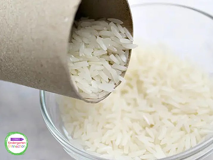 Add 2-3 spoonfuls of rice to the tube.