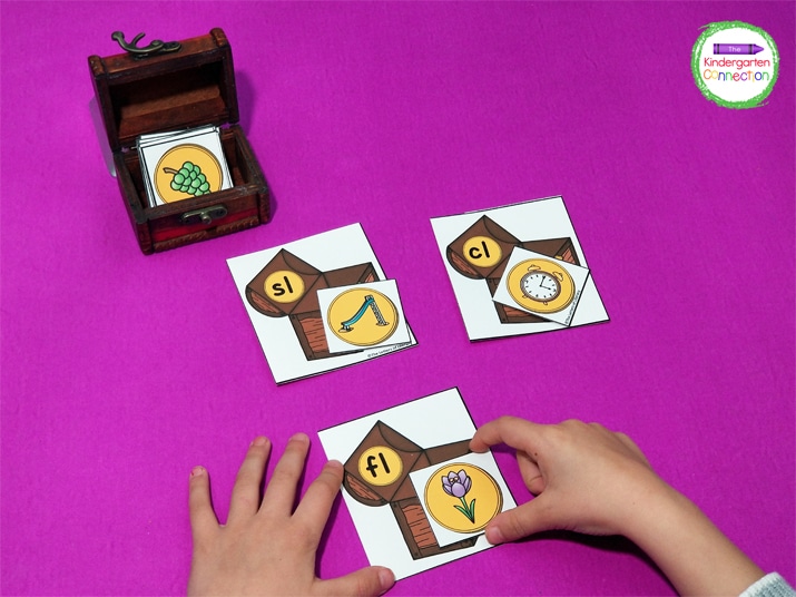 Students pick a beginning picture coin card and match it to the beginning blends treasure chest card.