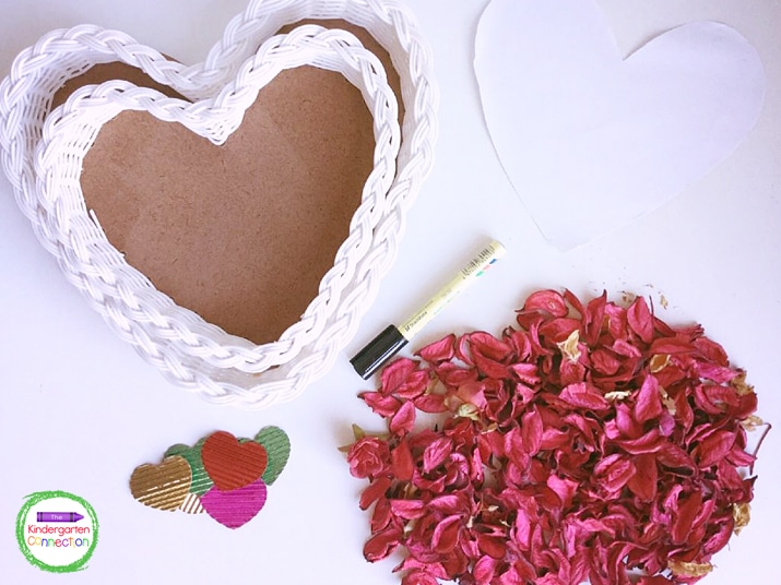 Grab a tray, write sight words on heart-shaped paper, and cover with rose petals for a fun sight word search activity!