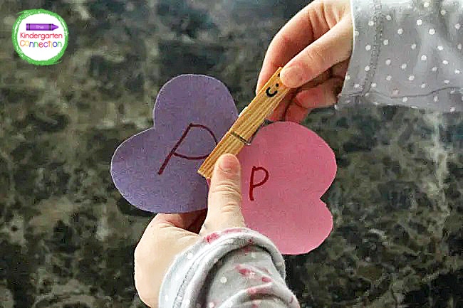 Clipping the unclipping the clothespins to form the "butterfly" is great fine motor practice.