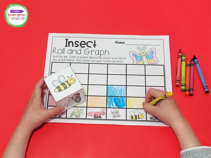 Students roll the die and color a space above that insect on their recording sheet.