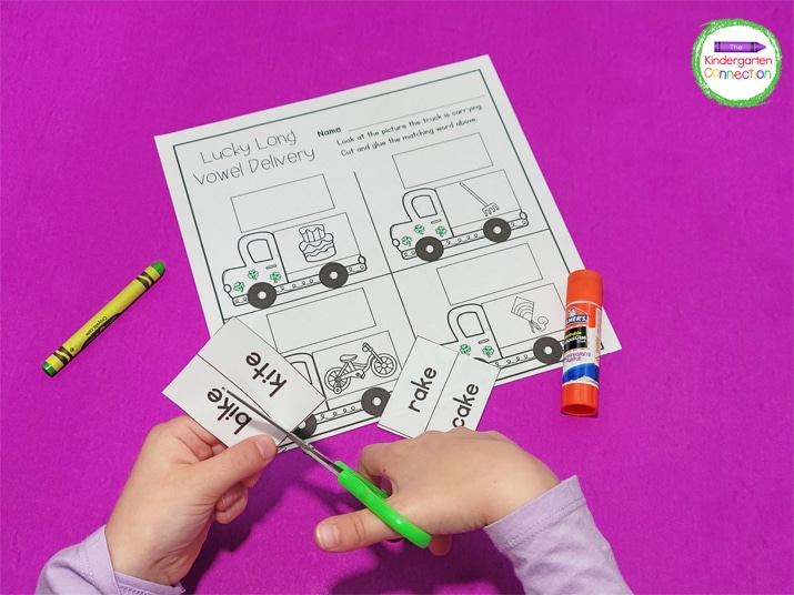 For this cut and paste, kiddos name the pictures on the printable and cut and paste the matching words on the delivery trucks.