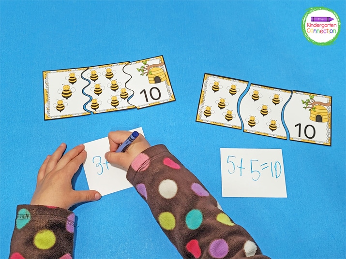 For a challenge or extension activity, give kids mini-whiteboards or scraps of paper to record the addition equations on.