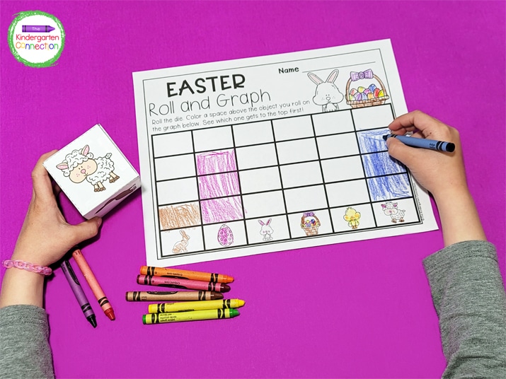 Students roll the die and color a space above that Easter picture on their recording sheet.