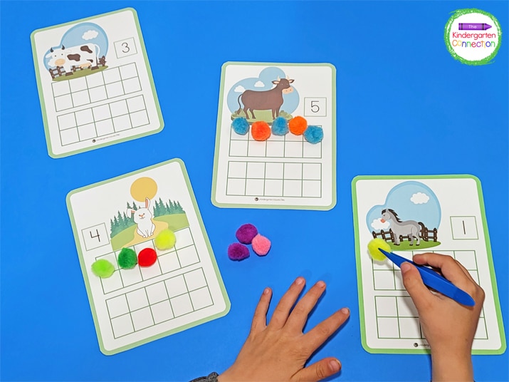 Students can use plastic tweezers and manipulatives like pom poms to fill the twenty frames.