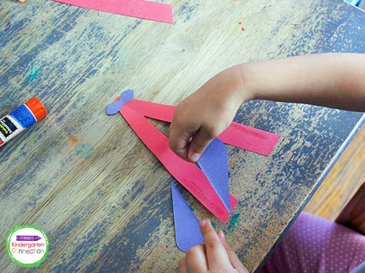 Kids can glue the right-angle triangles to the letter A as the wings.