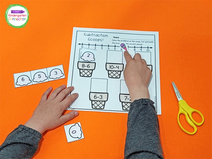 Kids will have a blast solving the problems on the cones and cutting and pasting the scoop with the correct answer above the cone.