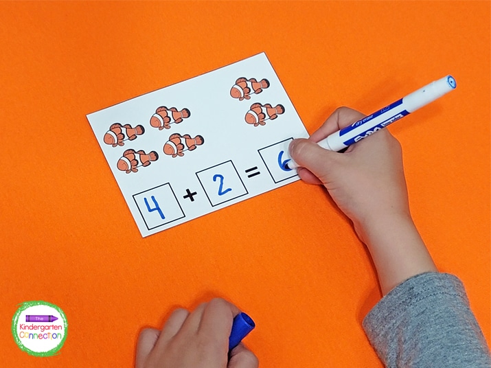 Once the cards are laminated, students can use dry erase markers to write their addition sentences.