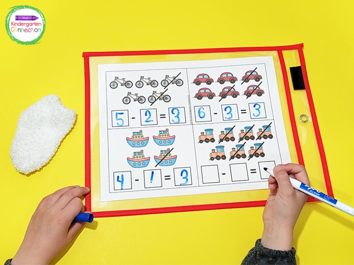 Make the subtraction cards reusable by placing whole sheets of the cards in dry erase pocket sleeves.