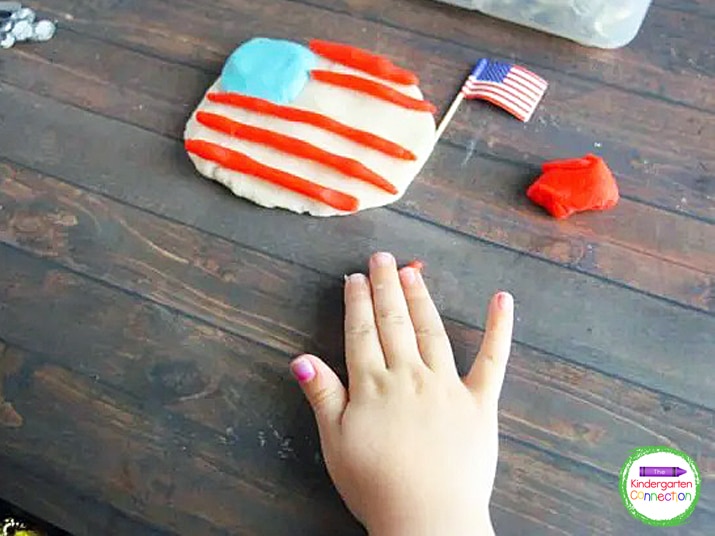 My daughter made a play dough flag using the toothpick flag as a guide.