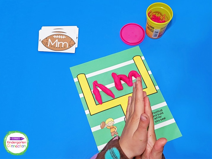 Students will pick a letter card and build the letter with play dough on the football field play dough mat.