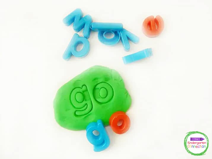 Alphabet magnets are perfect to stamp down into the play dough to spell sight words.