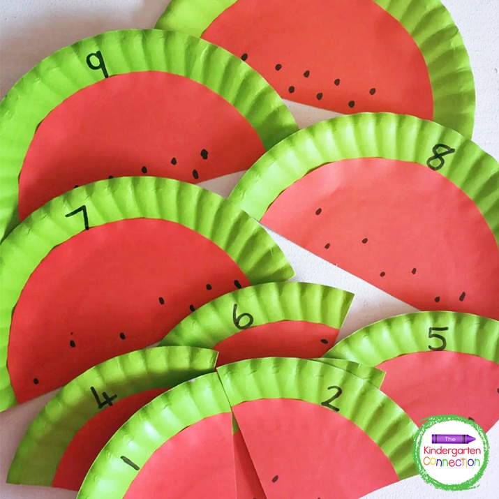 Use a marker to write numbers on each watermelon card and draw the corresponding number of "seeds."