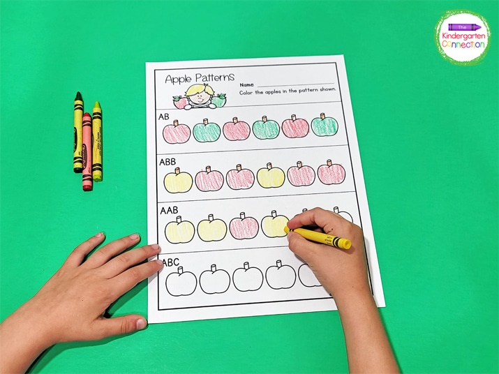 Give your kids some crayons and they can get started identifying and coloring the apples according to the pattern shown.