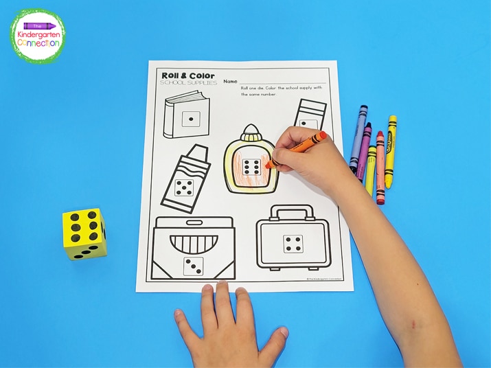 Using foam dice adds an extra element of fun to this roll and color activity.