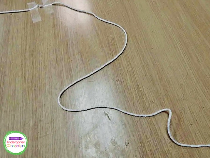 I also tape the other end of the string directly to the table.