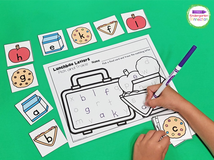 To complete this letter writing activity, students pick a letter card and find and trace the letter on the recording sheet.