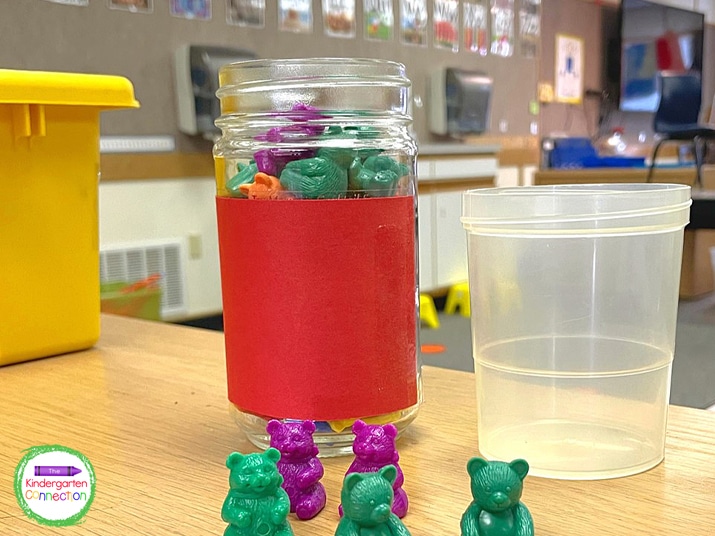 Using a clear container allows the students to see the number of bears as they practice one-to-one correspondence.