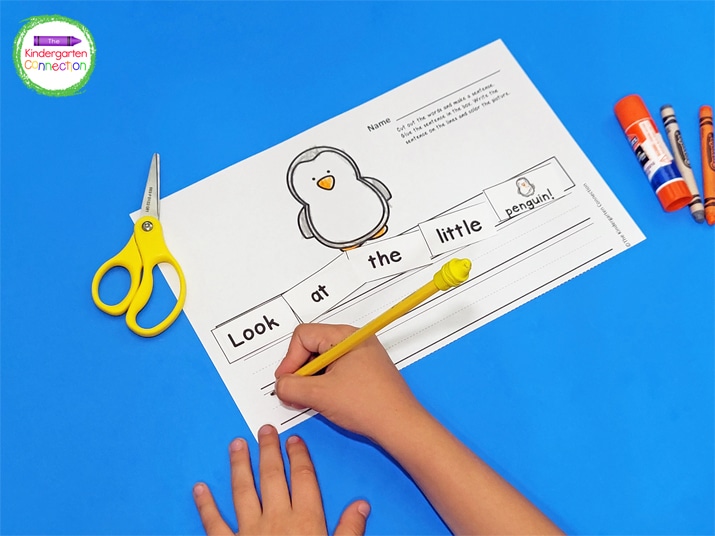 The printable cut and paste activity includes a space for students to copy the sentence.