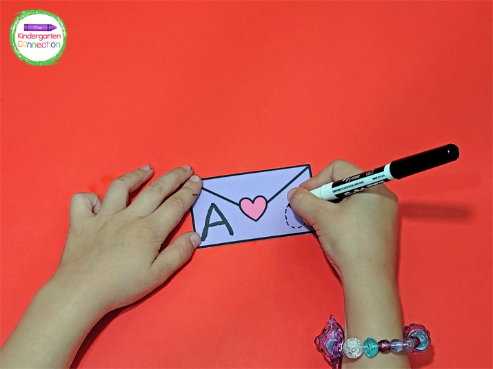 Laminate the Valentine letter writing cards and students can use dry erase markers to trace.