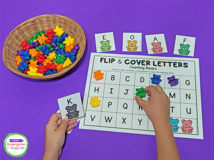 Choose a letter card and cover it with a counting bear on the mat.