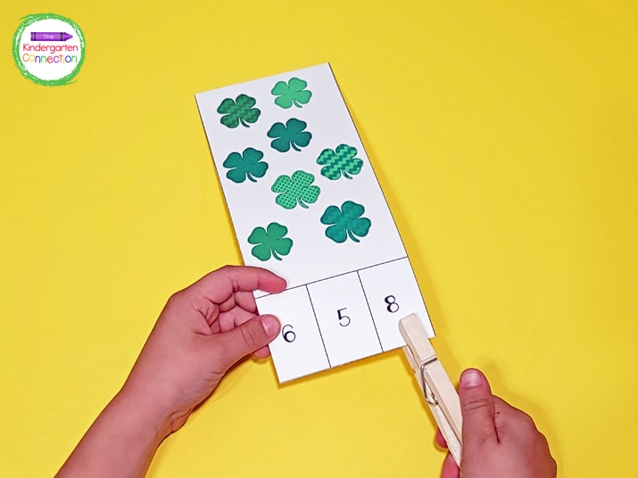 Students will count the clovers on the clip card and clip the correct number on the bottom.