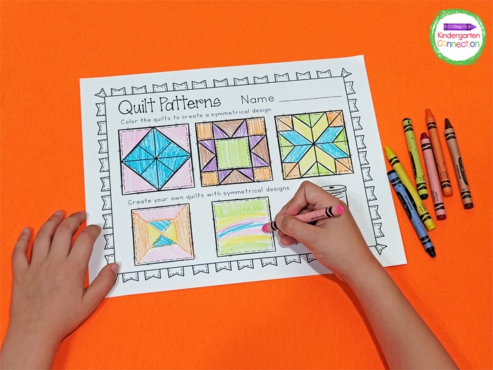 The bottom row of quilts allows students to draw and color their own symmetrical quilts.