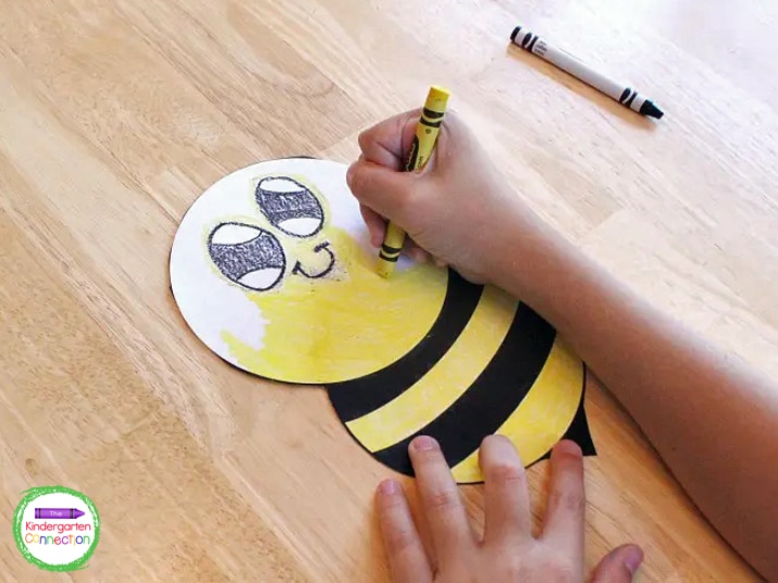 Kids can draw and color their own bee faces on the template.