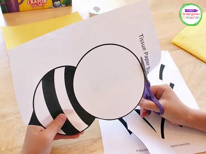 After you print out the craft template, start by cutting out the bumble bee body.