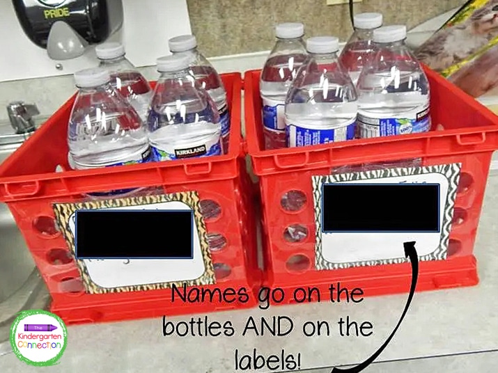 The labels on the front of the bins show students which bin to store their water bottle in.