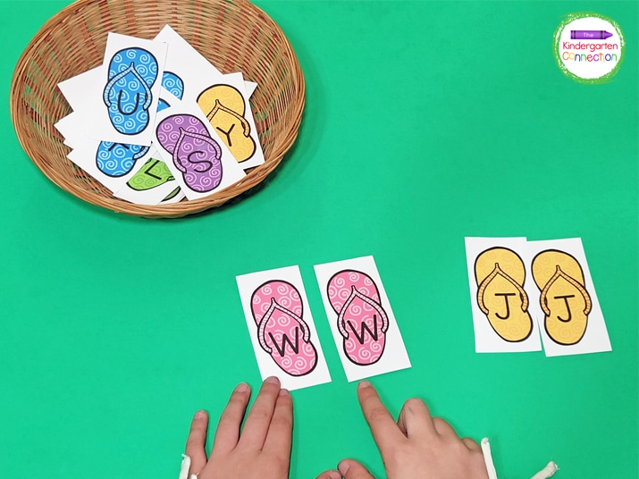 Students will match the uppercase letters to make one pair of flip flops that have a matching color.