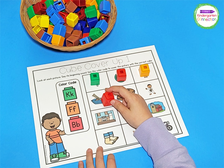 Students use the cube color code to cover each picture according to their beginning sound.