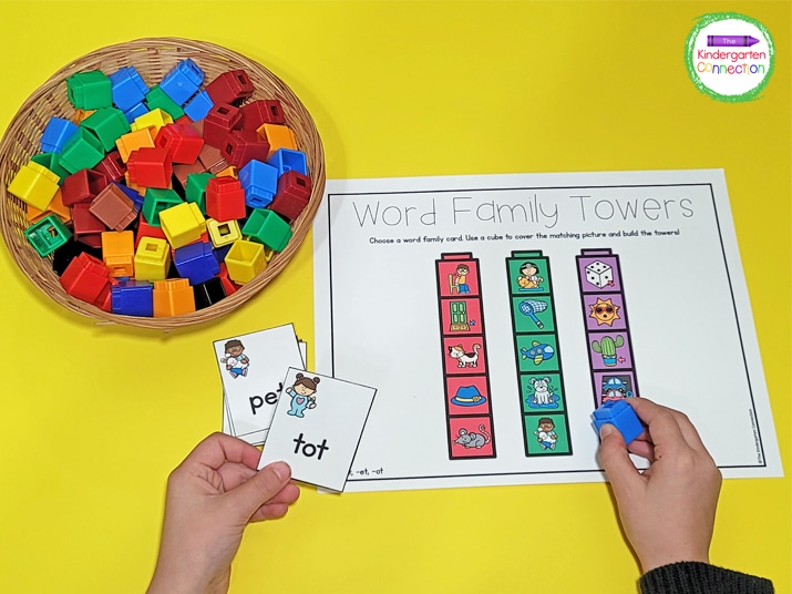 Kids pick a word card and cover the matching picture to build the word family towers.