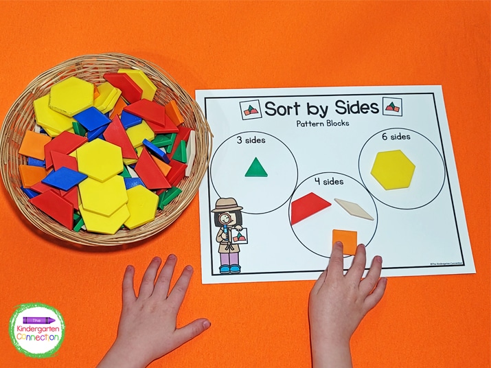 For the Sort by Sides mat, choose a pattern block and place it in the circle with the corresponding number of sides.