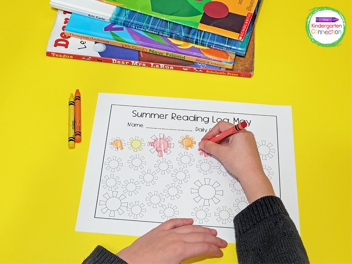 Each day after reading, kids can color a fun summer item like the suns on the May reading log.