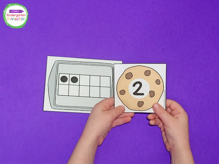 Each cookie sheet ten frame card has a cookie card with a number that matches.