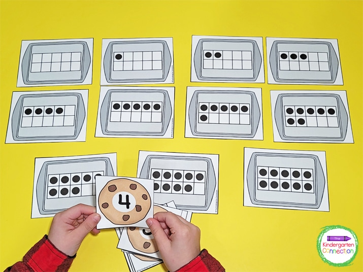 We started by laying out the cookie sheet ten frame cards from 0-10.
