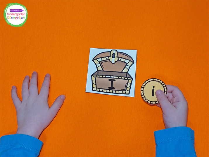 This download includes uppercase treasure chest letter cards and matching lowercase coin letter cards.