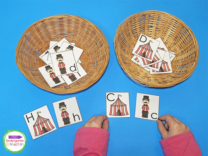 Add the letter pieces to two small baskets for kids to choose from and make matches.