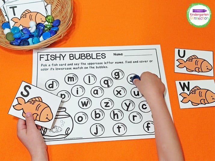 Print the fish letter cards and recording sheet to play this Fishy Bubbles Alphabet Match.