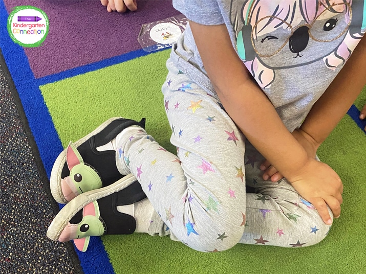 Alternative seating options like legs to the side can help students focus and be more still.
