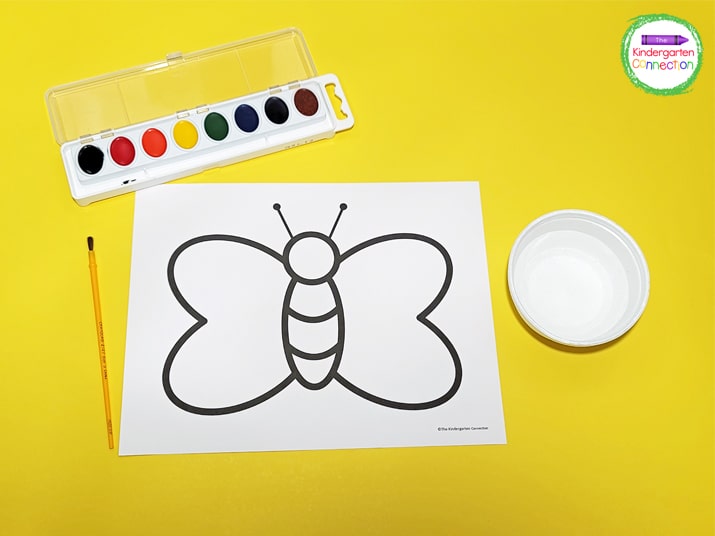 To get started, grab some watercolors, a bowl of water, and print the butterfly template.