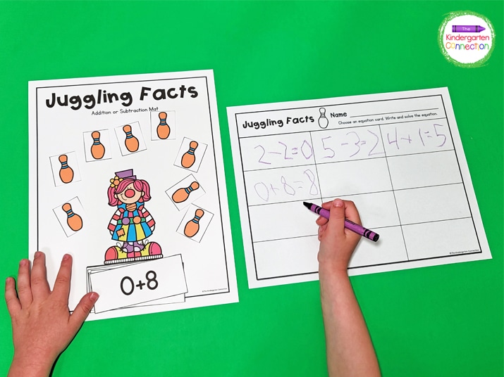 Choose an addition fact card and use the juggling pins to solve the equation.