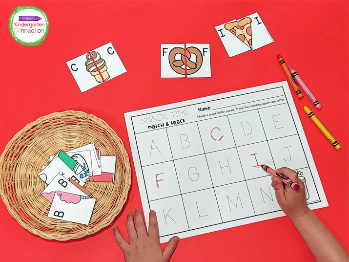 After matching the circus snacks letter puzzles, trace the letters on the recording sheet.