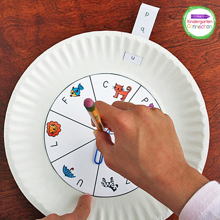 This uppercase and lowercase letter matching activity has both a spinner and a slider. Kids spin the spinner to get a capital letter. Then, they slide the slider to the matching lowercase letter.