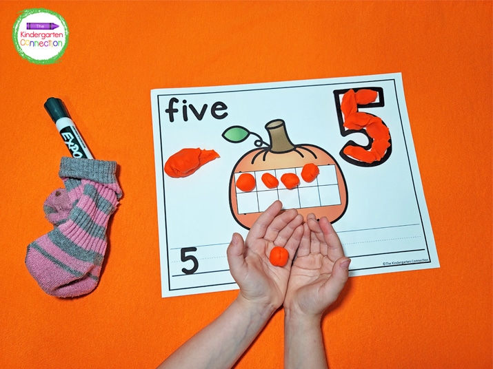 Students will use the play dough to fill the ten frame and the number in the corner of the mat.