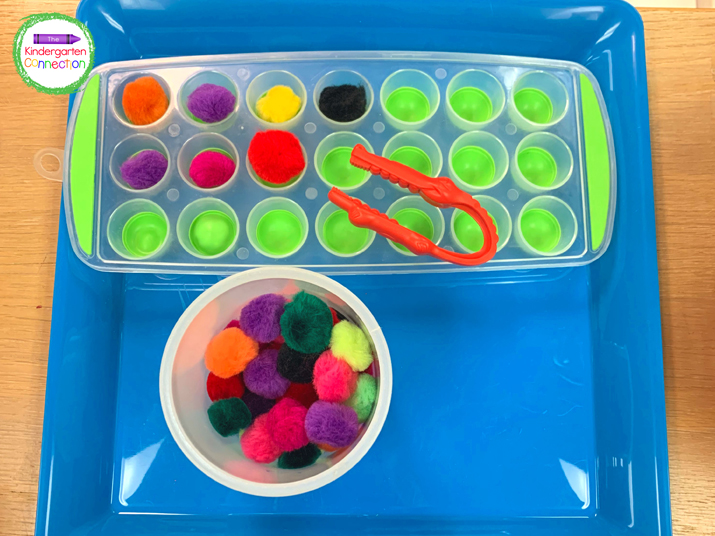 Give students jumbo tweezers to transfer pom poms to an ice cube tray.